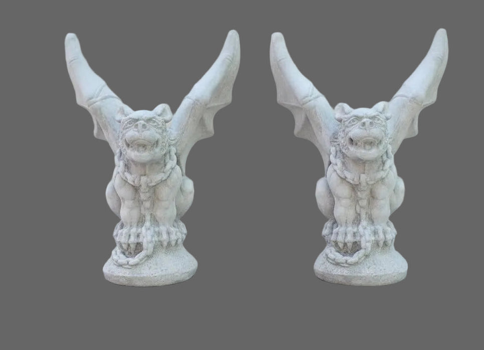 PAIR OF LARGE CONCRETE GARGOYLES