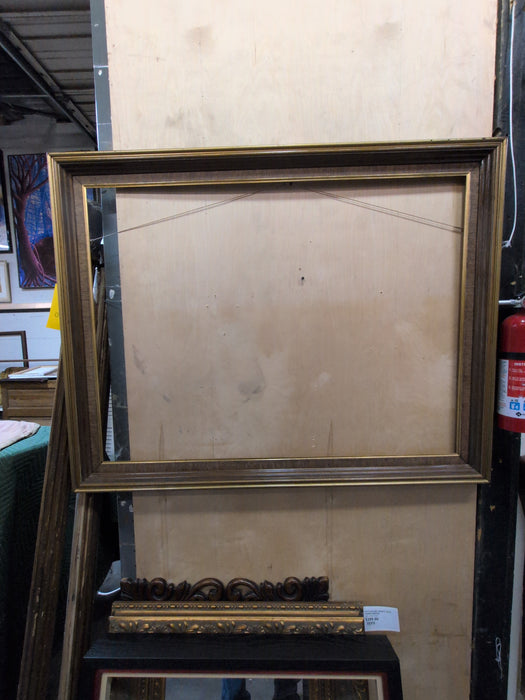 LARGE GOLD FRAME WITH DARK LINEN FILET 40”W 30”L