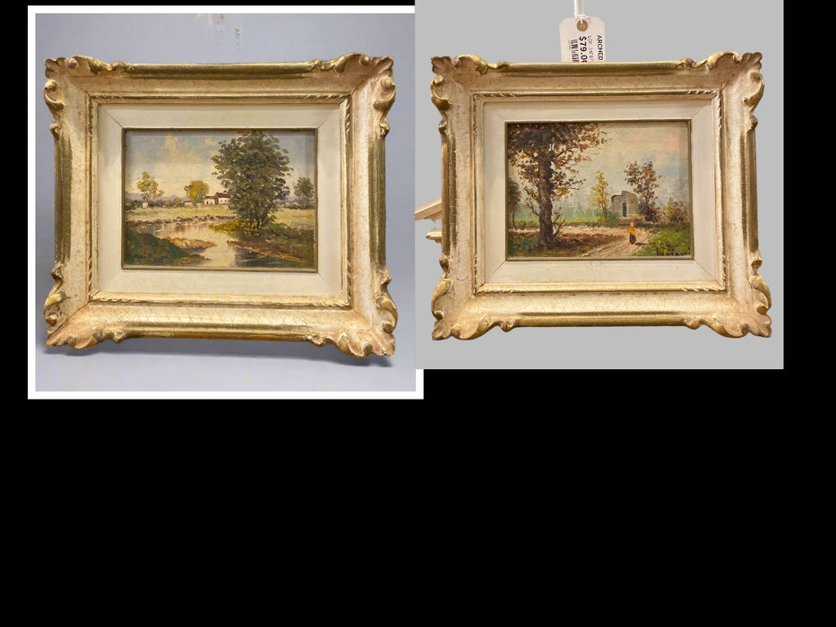 PAIR OF SMALL WHITE FRAMED LANDSCAPE OIL PAINTINGS WITH POND AND LADY ON ROAD