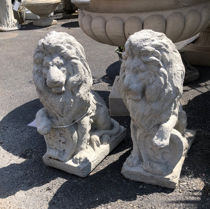 PAIR OF SMALL CONCRETE LIONS