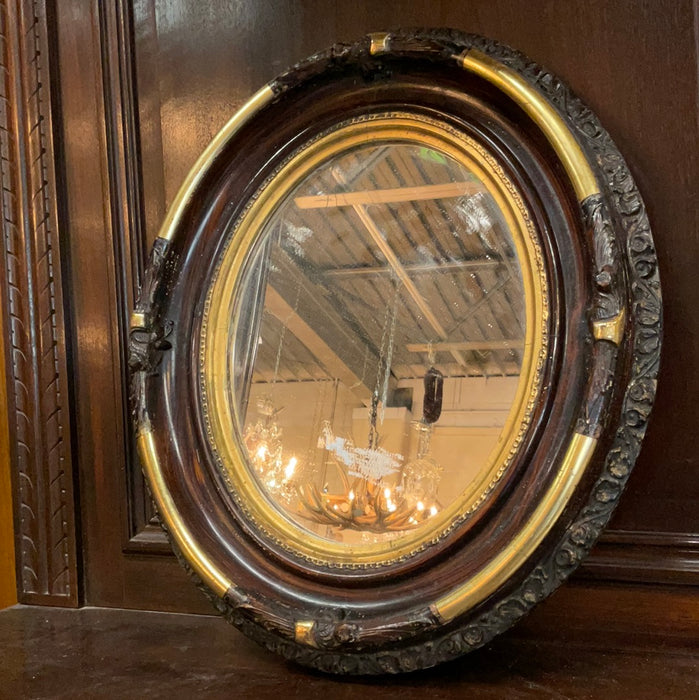 FAUX ROSEWOOD & GILT OVAL MIRROR