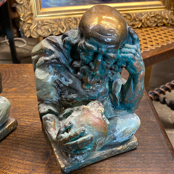PAIR OF BRONZE CLAD SKULL STUDY BOOKENDS