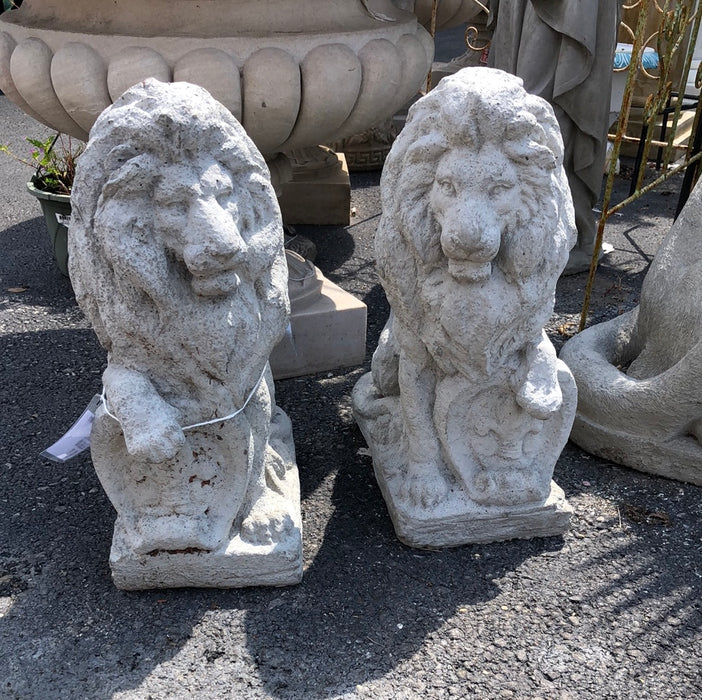 PAIR OF SMALL CONCRETE LIONS