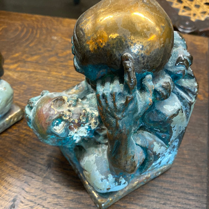 PAIR OF BRONZE CLAD SKULL STUDY BOOKENDS