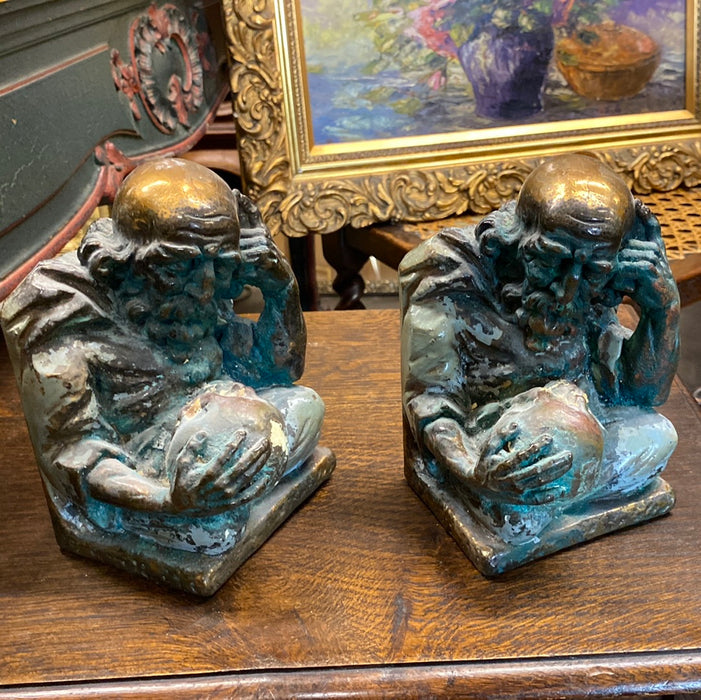 PAIR OF BRONZE CLAD SKULL STUDY BOOKENDS