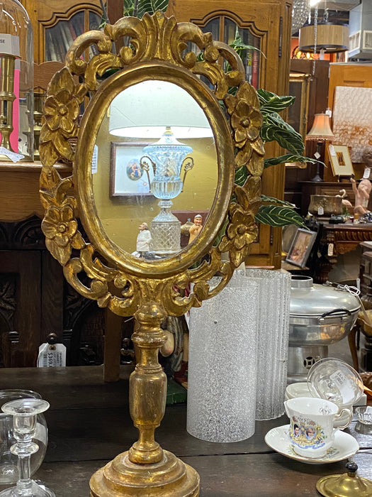 OVAL GILT TABLE TOP MIRROR ON WOOD STAND