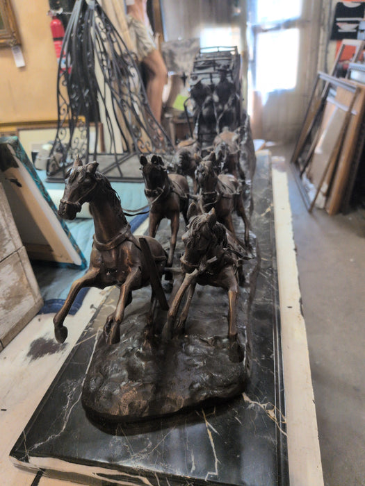 BRONZE AND MARBLE STAGE COUCH SCULPTURE