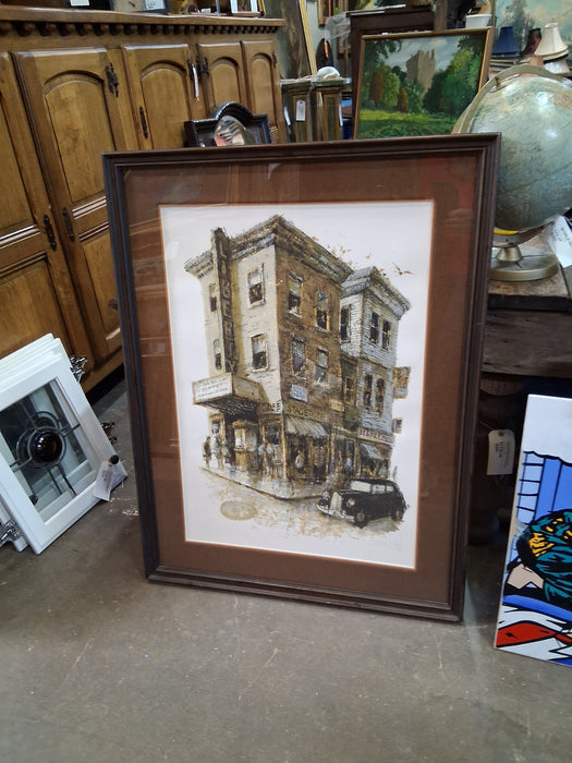 FRAMED SIGNED AND NUMBERED SERIGRAPH OF A DILAPIDATED THEATRE BUILDING