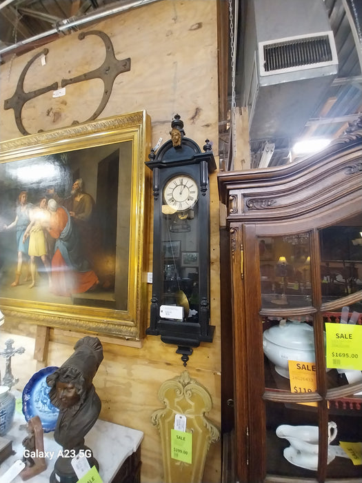 EBONIZED RENAISSANCE REVIVAL WALL CLOCK WITH FACE OF COLUMBIA