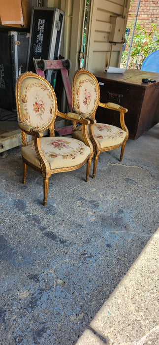 PAIR OF LOUIS XVI NEEDLEPOINT GILT FAUTEUILS (OPEN ARM CHAIRS}