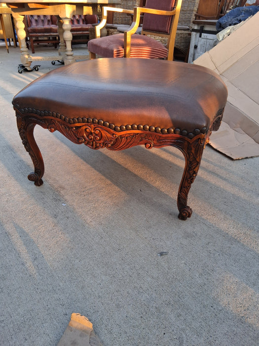 THEODORE ALEXANDER CARVED FRENCH STYLE OTTOMAN WITH LEATHER