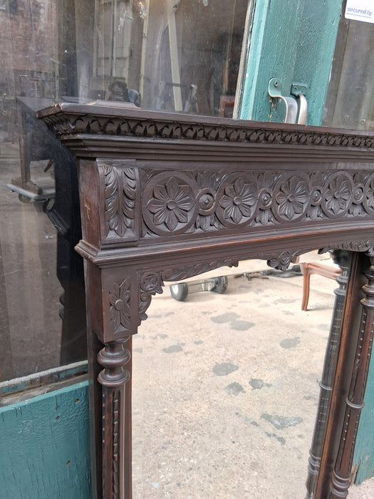 BRITTIANY CARVED DARK OAK MIRROR WITH FLORETTES