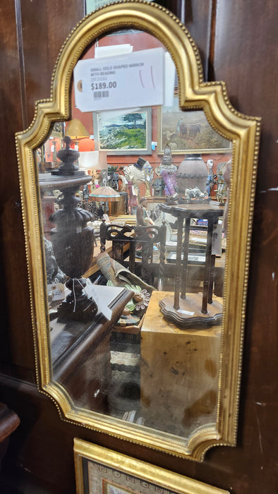 SMALL GOLD SHAPED MIRROR WITH BEADING