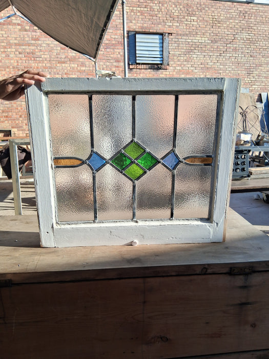 WHITE FRAMED MEDIUM GEOMETRIC ENGLISH STAINED GLASS WINDOW