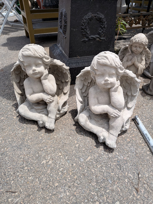 PAIR OF SMALL CONCRETE ANGELS REFLECTING