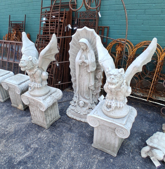 PAIR OF LARGE CONCRETE GARGOYLES