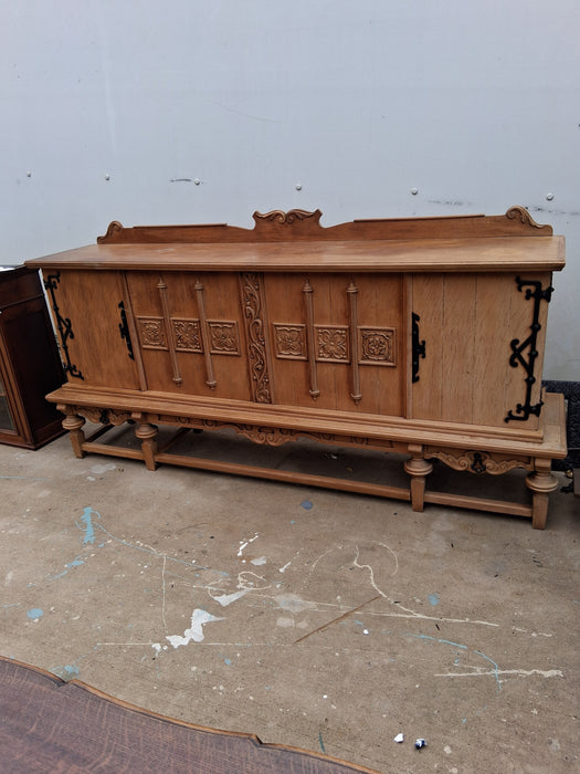 LARGE RUSTIC OAK SIDEBOARD WITH ORNATE IRON HINGES