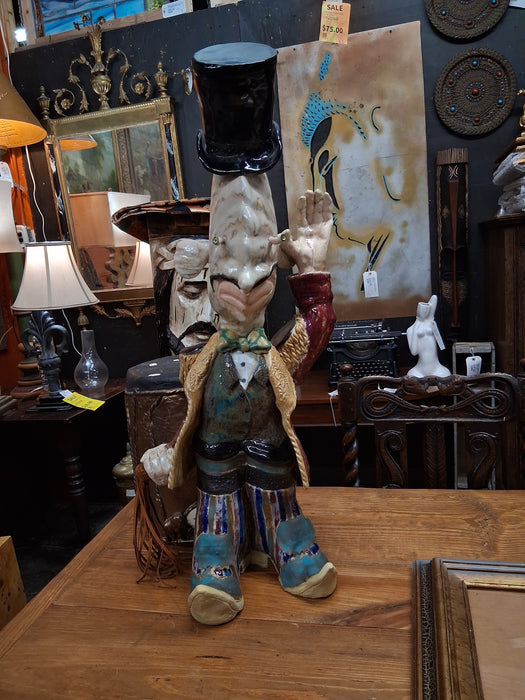 LARGE BUG EYED POTTERY FIGURE WAVING BY TERRI WILDER