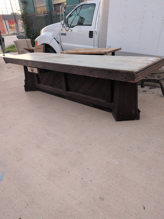 LONG WORK TABLE WITH WHITE TOP AND FANCY BASE