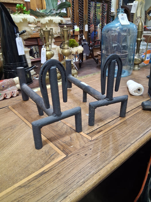 PAIR OF BLACK IRON HORSE SHOE AND IRONS