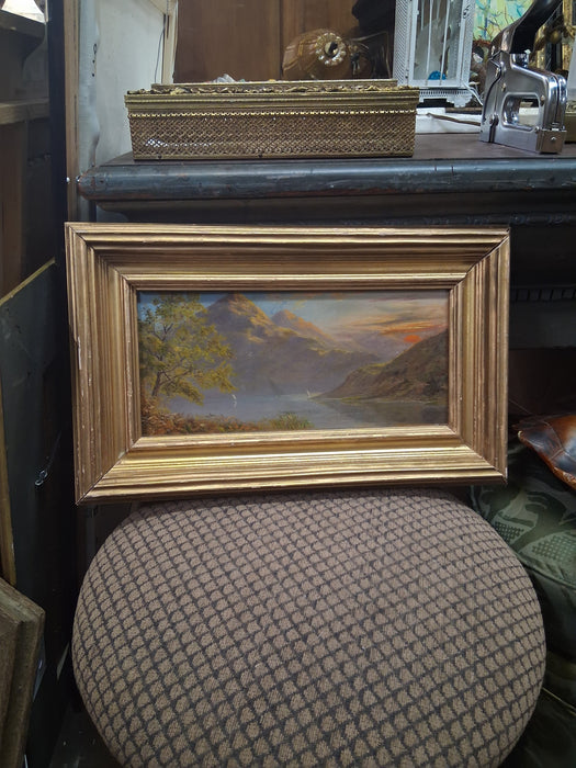 SMALL FRAMED OIL PAINTING WITH RED SUN