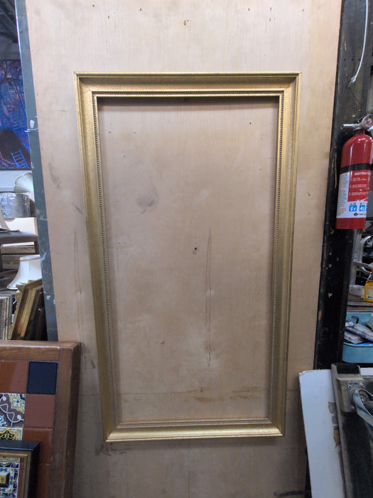 LARGE THIN  MOTTLED GOLD FRAME