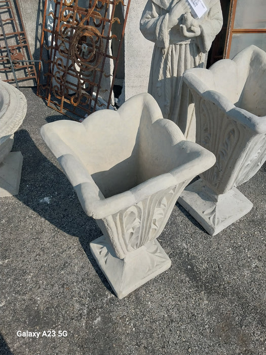 PAIR OF TALL CONCRETE PLANTERS