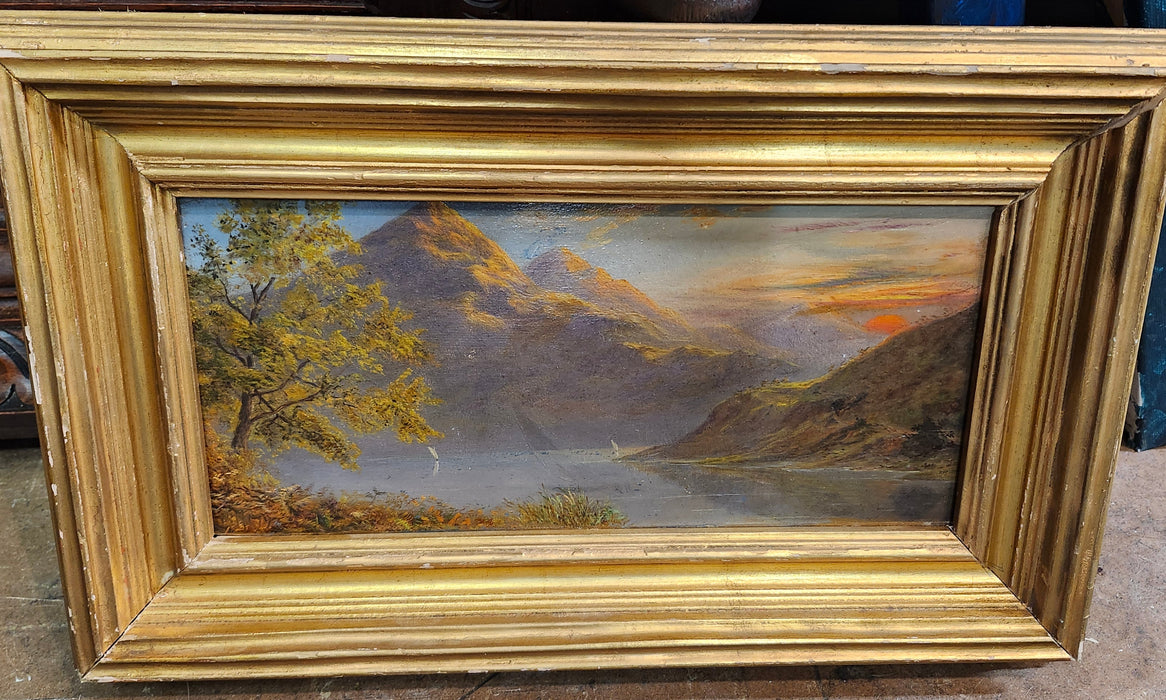 SMALL FRAMED OIL PAINTING WITH RED SUN