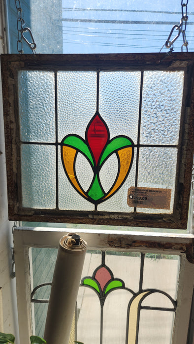 STAINED GLASS WINDOW  IN METAL FRAME