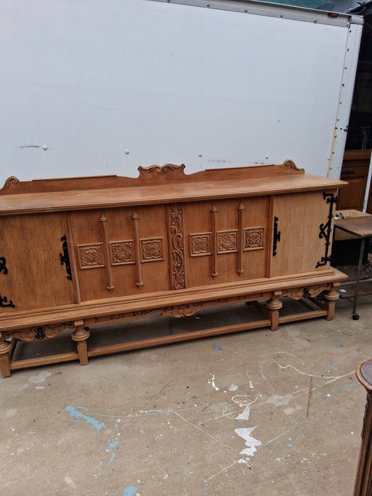 LARGE RUSTIC OAK SIDEBOARD WITH ORNATE IRON HINGES
