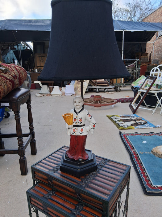 CHINESE FIGURAL LAMP WITH BLACK PAGODA SHADE