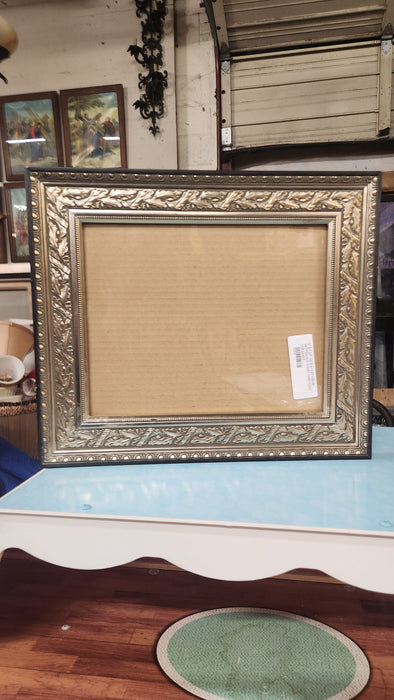 8" BY  10" SILVER FLAT FRAME WITH SILVER LEAVES EMBOSSED