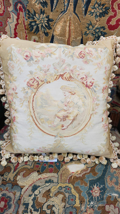 AUBUSSON PILLOW WITH FIGURE ON IT