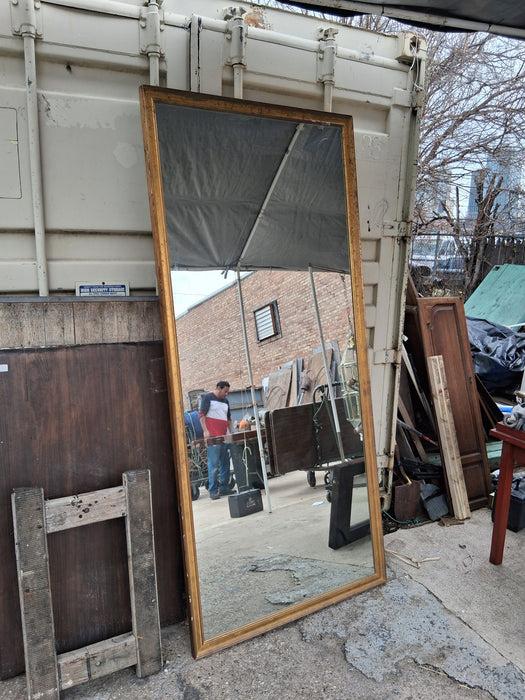 TALL GILT FRAMED MIRROR