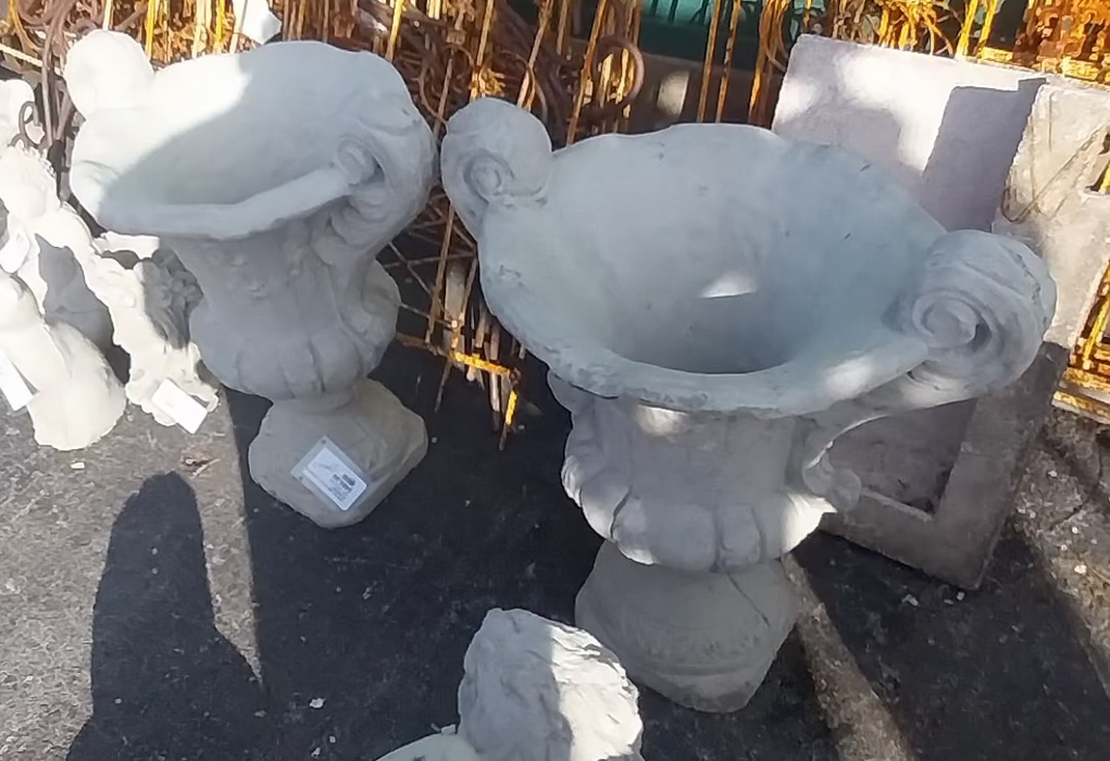 PAIR OF URN STYLE CONCRETE PLANTERS