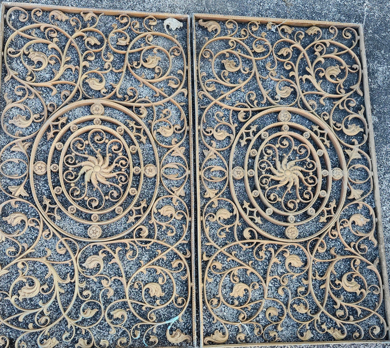 PAIR GOLD CAST IRON FANCY PANELS