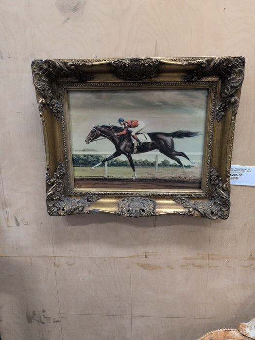 GILT FRAMED PRINT OF JOCKEY RIDING A HORSE