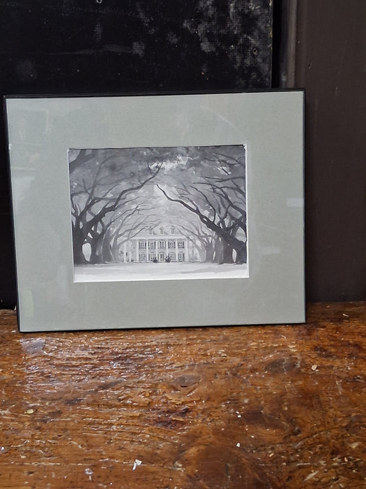 BLACK AND WHITE PRINT OF A HOUSE IN WINTER