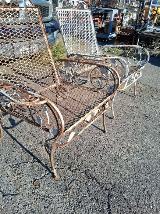 PAIR OF IRON LEAF ARM CHAIRS WITH LARGE MESH SEAT