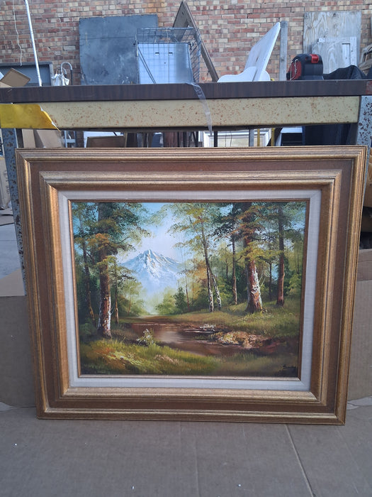 FRAMED LANDSCAPE OIL PAINTING OF TREES AND A MOUNTAIN SIGNED HENRY