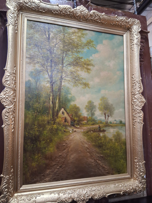 GILT FRAMED OIL PAINTING OF CHICKENS ALONG THE RIVER BANK AN A MAN IN A BOAT