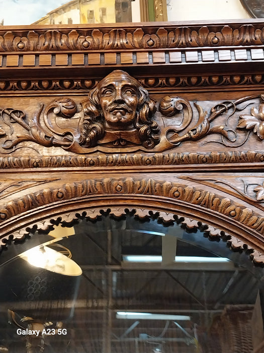 INCREDIBLE FRENCH FIGURAL CARVED SINGLE DOOR BOOKCASE
