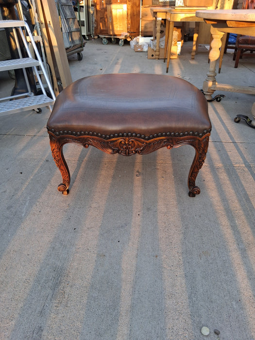 THEODORE ALEXANDER CARVED FRENCH STYLE OTTOMAN WITH LEATHER