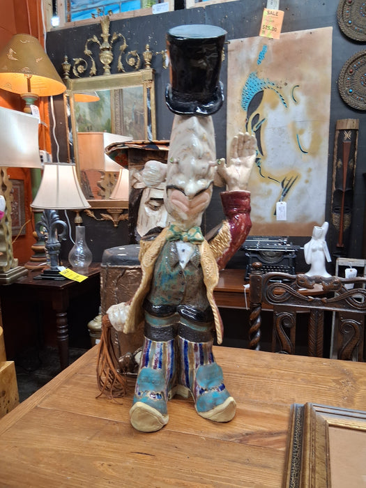 LARGE BUG EYED POTTERY FIGURE WAVING BY TERRI WILDER