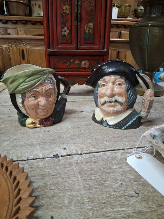 PAIR OF HANDLED HEAD MUGS
