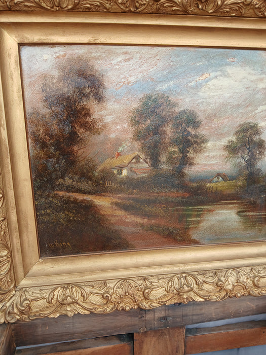 SMALL FRAMED LANDSCAPE OIL PAINTING WITH HOUSES