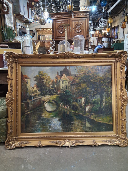 LARGE FRAMED OIL PAINTING OF A CANAL SCENE-AS FOUND