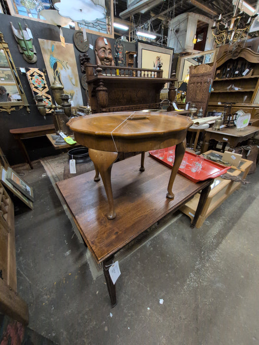LOW ROUND WALNUT SIDE TABLE WITH SHAPED EDGE