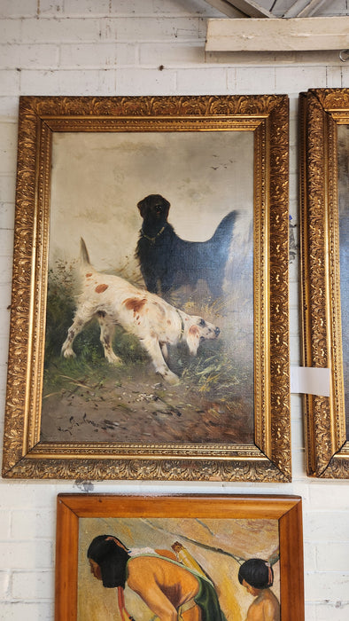 PAIR OF GILT FRAMED OIL PAINTINGs OF DOGS SIGNED SCHOUTEN