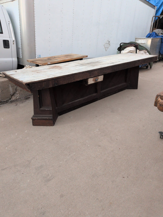 LONG WORK TABLE WITH WHITE TOP AND FANCY BASE